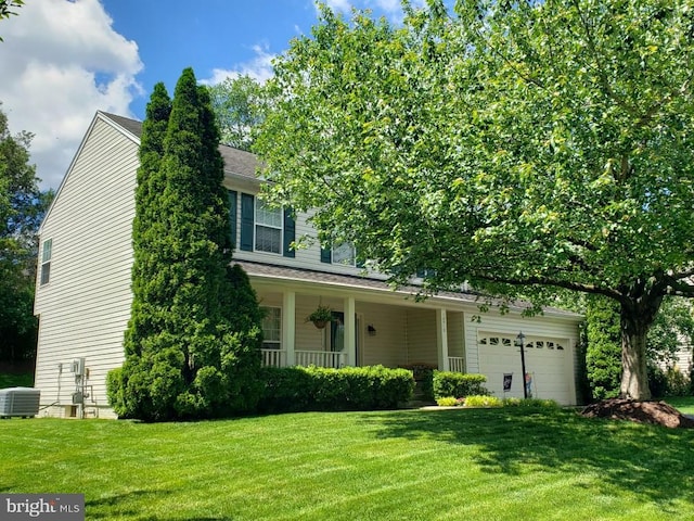 10512 Winged Elm Cir, Manassas, VA 20110 - view of property hidden behind natural elements with central AC unit, a front yard, covered porch, and an attached garage