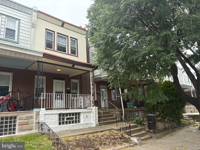 4728 Marple St, Philadelphia, PA 19136 - multi unit property featuring a porch and brick siding