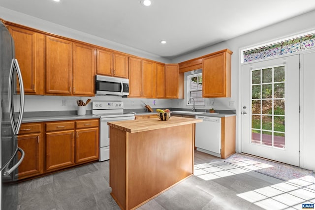 4760 Bluejay Way, Charlottesville, VA 22911 - kitchen featuring stainless steel appliances, a sink, butcher block counters, recessed lighting, and brown cabinets
