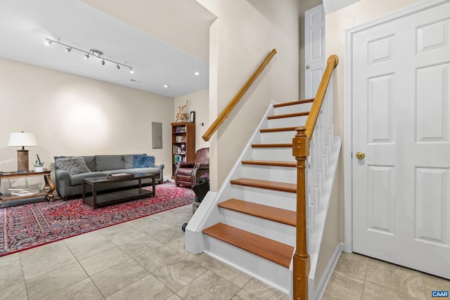 4760 Bluejay Way, Charlottesville, VA 22911 - stairs with baseboards, tile patterned floors, and track lighting