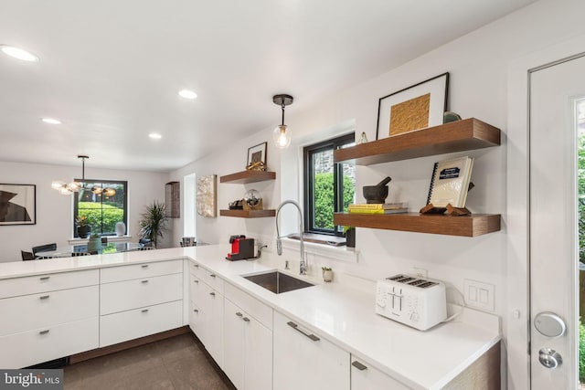 137 Sutton Rd, Ardmore, PA 19003 - kitchen featuring open shelves, a sink, healthy amount of natural light, white cabinets, and recessed lighting