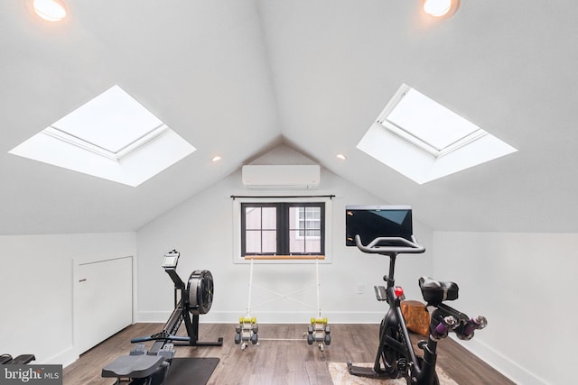 137 Sutton Rd, Ardmore, PA 19003 - exercise room with a skylight, a wall unit AC, wood finished floors, vaulted ceiling, and baseboards