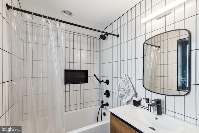 137 Sutton Rd, Ardmore, PA 19003 - full bathroom featuring tile walls, shower / bath combo with shower curtain, vanity, and decorative backsplash