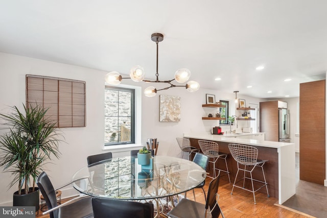 137 Sutton Rd, Ardmore, PA 19003 - dining area with a chandelier, light wood-type flooring, and recessed lighting