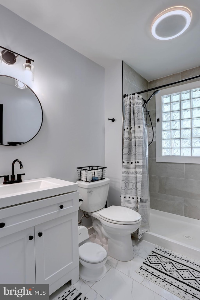 3530 Baker Rd, Westminster, MD 21157 - full bath with toilet, vanity, a tile shower, and marble finish flooring