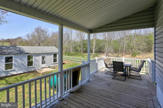3530 Baker Rd, Westminster, MD 21157 - deck featuring outdoor dining area, an outbuilding, and a lawn
