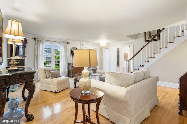 7 Seedling Dr, Holland, PA 18966 - living room featuring light wood finished floors, stairs, and baseboards