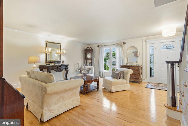 7 Seedling Dr, Holland, PA 18966 - living room with light wood finished floors and ornamental molding