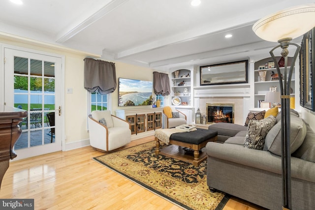 7 Seedling Dr, Holland, PA 18966 - living room with wood finished floors, a high end fireplace, beamed ceiling, recessed lighting, and baseboards