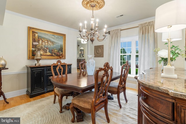 7 Seedling Dr, Holland, PA 18966 - dining room featuring a chandelier, light wood finished floors, crown molding, and baseboards
