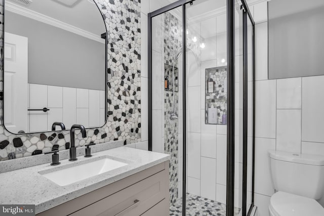 201 Aspen St, Middletown, PA 17057 - bathroom with ornamental molding, tile walls, toilet, vanity, and a stall shower