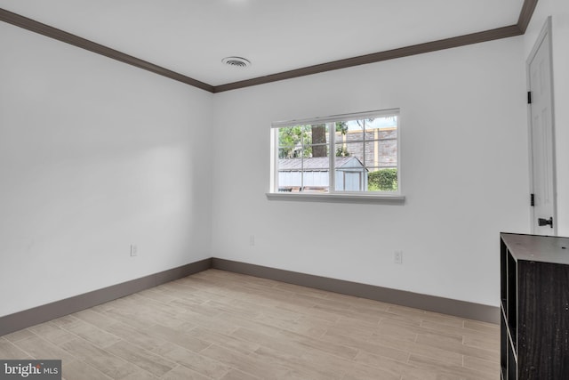 201 Aspen St, Middletown, PA 17057 - empty room with crown molding, baseboards, and light wood-style flooring