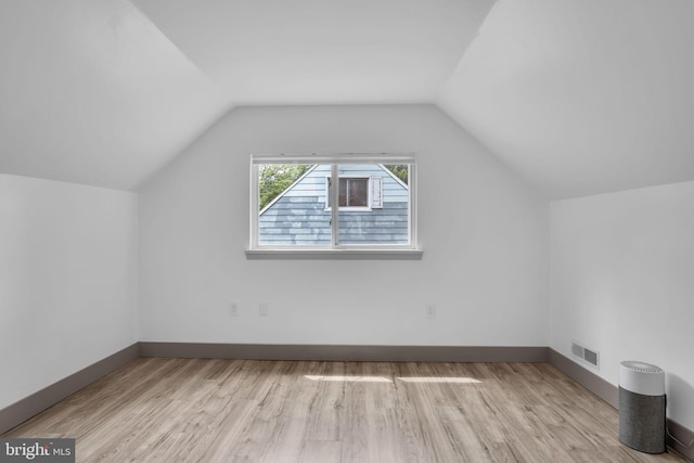 201 Aspen St, Middletown, PA 17057 - bonus room with wood finished floors, vaulted ceiling, and baseboards