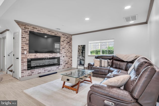 201 Aspen St, Middletown, PA 17057 - living area featuring a fireplace, ornamental molding, wood finished floors, and recessed lighting