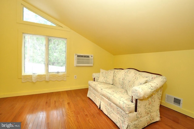 439 Landing St, Lumberton, NJ 08048 - sitting room featuring lofted ceiling, baseboards, wood finished floors, and an AC wall unit