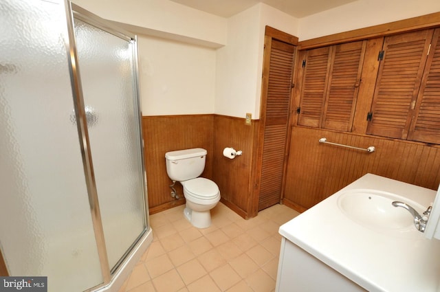 439 Landing St, Lumberton, NJ 08048 - bathroom with wainscoting, a shower stall, toilet, vanity, and tile patterned flooring