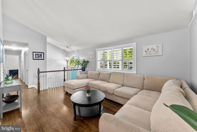 5209 Stonington Dr, Fairfax, VA 22032 - living room featuring vaulted ceiling, dark wood-type flooring, and baseboards