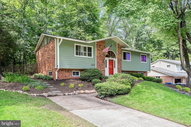 5209 Stonington Dr, Fairfax, VA 22032 - bi-level home with a front yard and brick siding