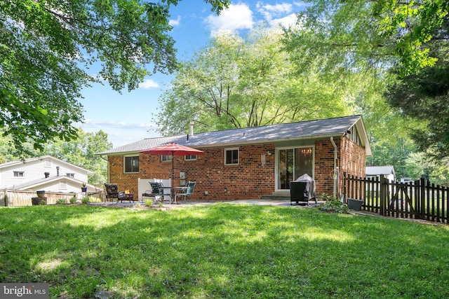 5209 Stonington Dr, Fairfax, VA 22032 - back of house with brick siding and a patio