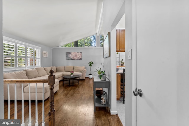 5209 Stonington Dr, Fairfax, VA 22032 - living room featuring vaulted ceiling, wood finished floors, and baseboards