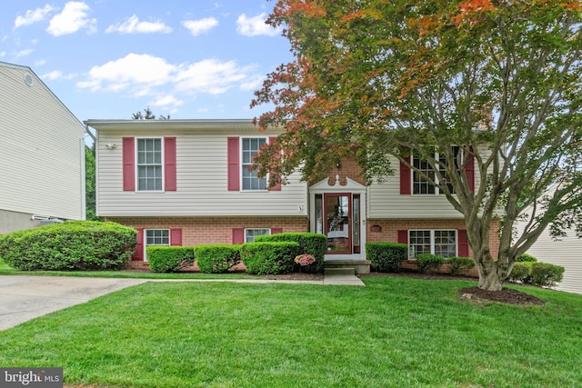 9717 Hickoryhurst Dr, Baltimore, MD 21236 - bi-level home with brick siding and a front yard