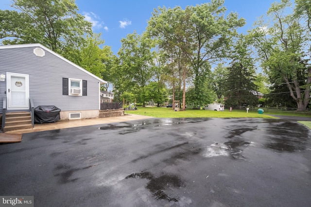 145 Nursery Ave, Levittown, PA 19057 - view of patio featuring view of wooded area