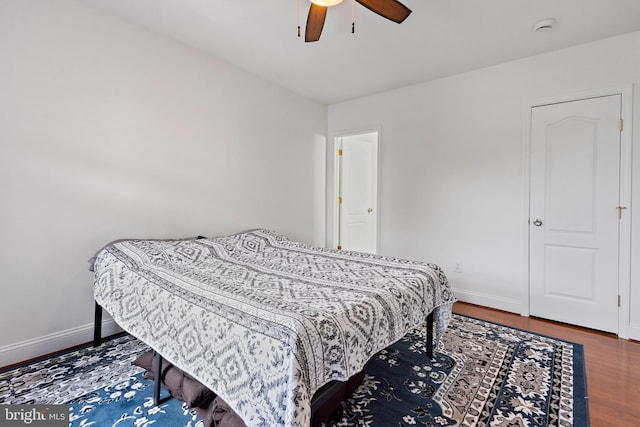 408 Kennedy St NW Unit 202, Washington, DC 20011 - bedroom with wood finished floors, baseboards, and ceiling fan