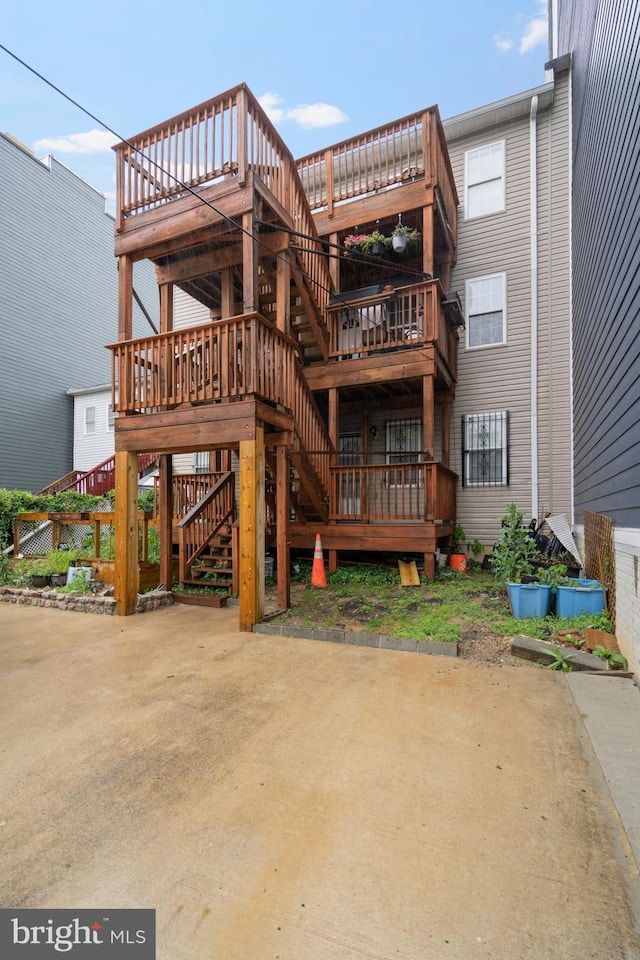 408 Kennedy St NW Unit 202, Washington, DC 20011 - rear view of house with stairs and a deck