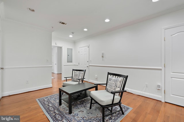 408 Kennedy St NW Unit 202, Washington, DC 20011 - living area with crown molding, light wood-type flooring, electric panel, recessed lighting, and baseboards