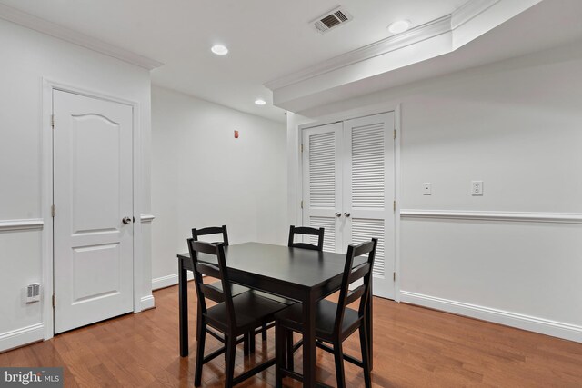 408 Kennedy St NW Unit 202, Washington, DC 20011 - dining space featuring crown molding, wood finished floors, recessed lighting, and baseboards