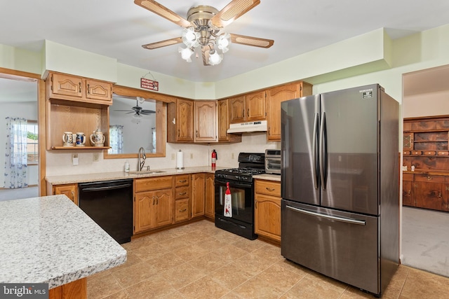 6 Trevett Blvd, Newark, DE 19702 - kitchen featuring black appliances, a ceiling fan, a sink, under cabinet range hood, and light countertops