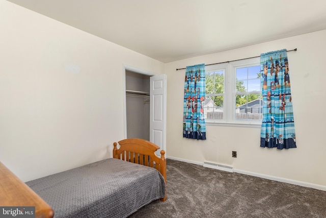 6 Trevett Blvd, Newark, DE 19702 - carpeted bedroom featuring a baseboard heating unit, baseboards, and a closet
