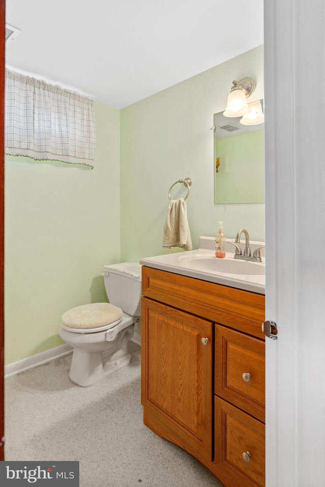 6 Trevett Blvd, Newark, DE 19702 - half bathroom with vanity, toilet, and baseboards
