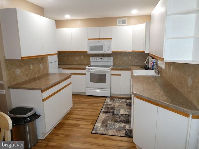 1314 Memory Ln, Hammonton, NJ 08037 - kitchen with white appliances, a sink, light wood finished floors, backsplash, and recessed lighting