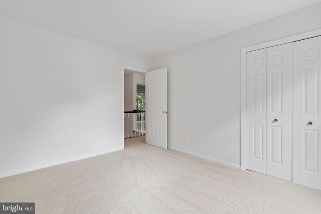 9728 Whetstone Dr, Montgomery Village, MD 20886 - unfurnished bedroom featuring carpet floors, a closet, and baseboards