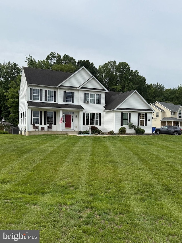 103 Lakshman Trl, Dover, DE 19904 - view of front of home with a front lawn, central AC unit, and a porch