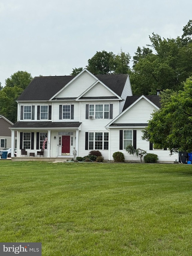 103 Lakshman Trl, Dover, DE 19904 - view of front of home with a front lawn and covered porch