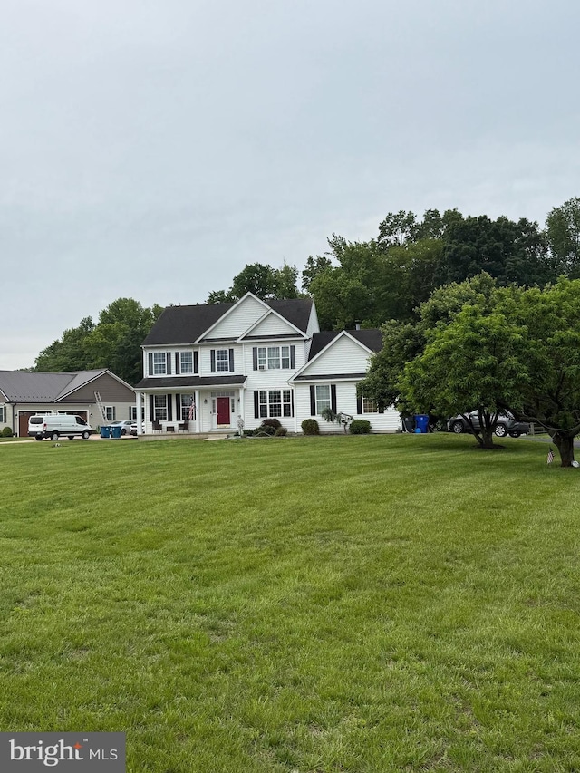 103 Lakshman Trl, Dover, DE 19904 - view of front of home featuring a porch and a front yard