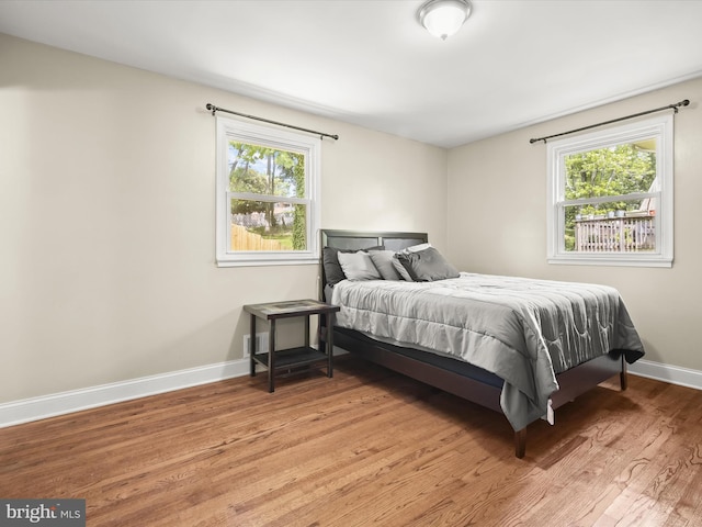 1736 Rhodesia Ave, Fort Washington, MD 20744 - bedroom with light wood-style flooring and baseboards