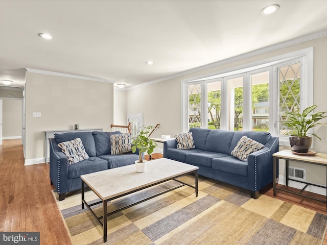 1736 Rhodesia Ave, Fort Washington, MD 20744 - living area featuring ornamental molding, recessed lighting, and light wood-type flooring