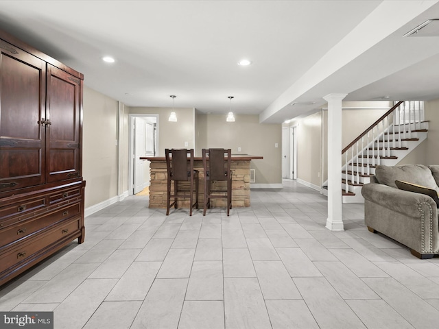 1736 Rhodesia Ave, Fort Washington, MD 20744 - dining space featuring a bar, stairs, recessed lighting, and light tile patterned flooring