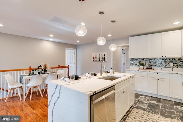 9900 Bird River Rd, Middle River, MD 21220 - kitchen featuring stainless steel dishwasher, a sink, white cabinets, recessed lighting, and decorative light fixtures
