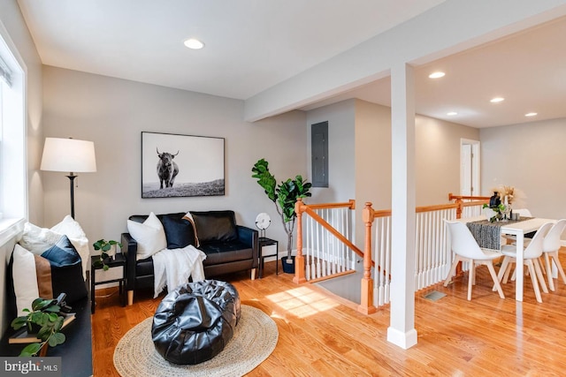 9900 Bird River Rd, Middle River, MD 21220 - living room featuring electric panel, wood finished floors, recessed lighting, and baseboards