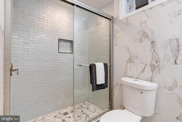 9900 Bird River Rd, Middle River, MD 21220 - bathroom with a shower stall, toilet, and tile walls