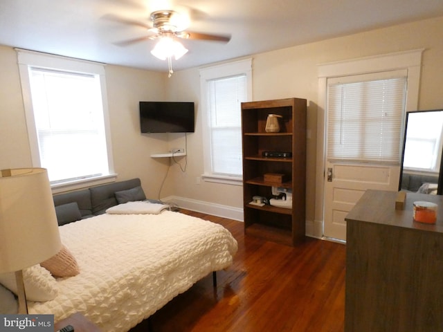 503 Division St, Harrisburg, PA 17110 - bedroom featuring dark wood-style floors, baseboards, and a ceiling fan