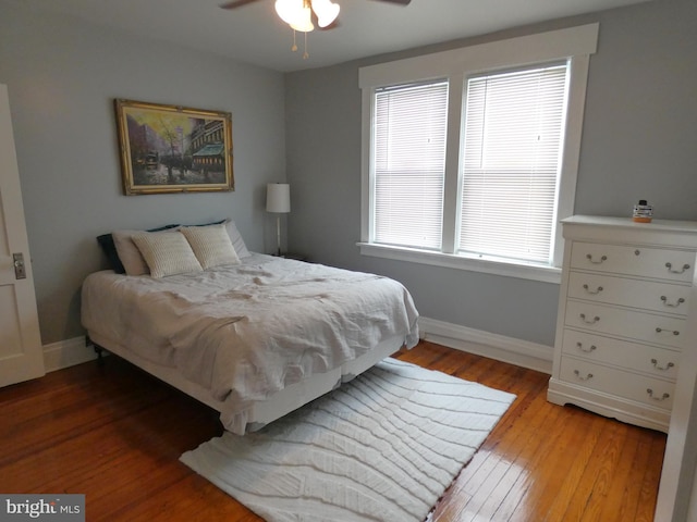 503 Division St, Harrisburg, PA 17110 - bedroom featuring baseboards, wood-type flooring, and a ceiling fan