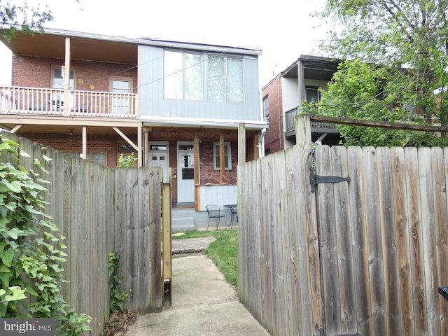 503 Division St, Harrisburg, PA 17110 - view of front of home with brick siding and a balcony