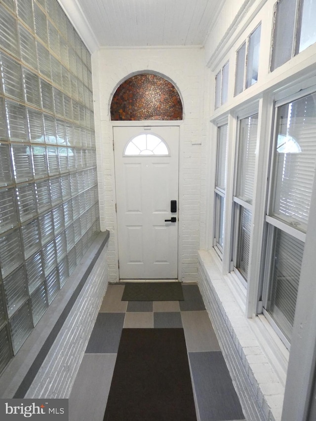 503 Division St, Harrisburg, PA 17110 - entrance foyer with ornamental molding and tile patterned floors
