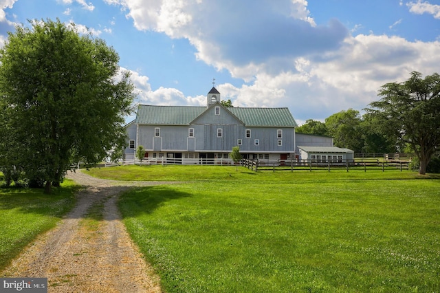 140 Evans Hill Rd, Reading, PA 19608 - rear view of house with metal roof and driveway