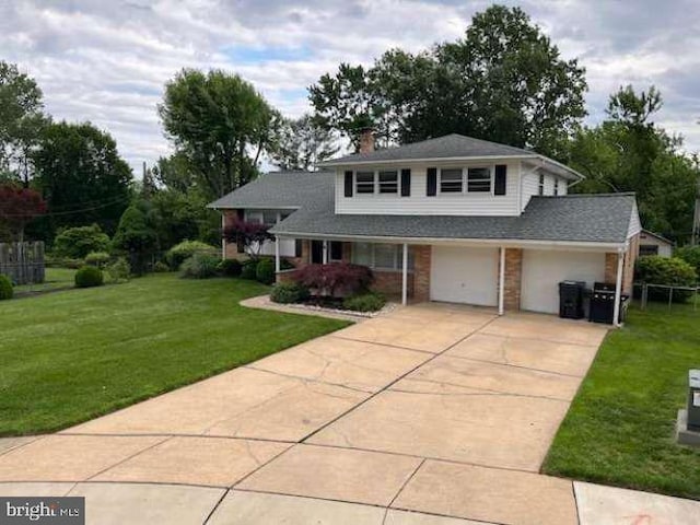17 Mcmechem Ct, Newark, DE 19711 - traditional home featuring driveway, brick siding, and a chimney
